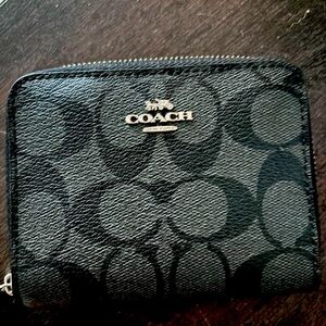 Coach zip around wallet. Barley used. Like new condition. $35